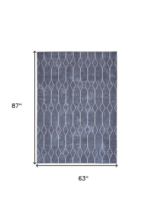 5' X 7' Blue and Ivory Geometric Power Loom Washable Area Rug