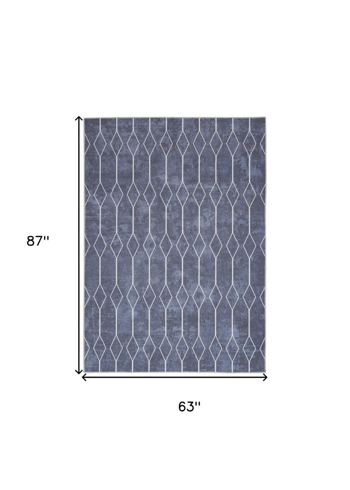 5' X 7' Blue and Ivory Geometric Power Loom Washable Area Rug