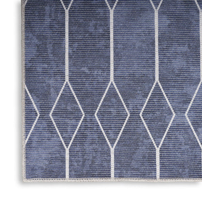 5' X 7' Blue and Ivory Geometric Power Loom Washable Area Rug