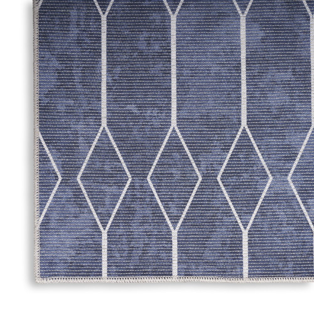 5' X 7' Blue and Ivory Geometric Power Loom Washable Area Rug