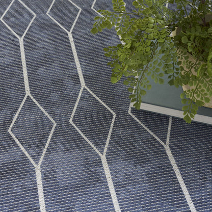 5' X 7' Blue and Ivory Geometric Power Loom Washable Area Rug