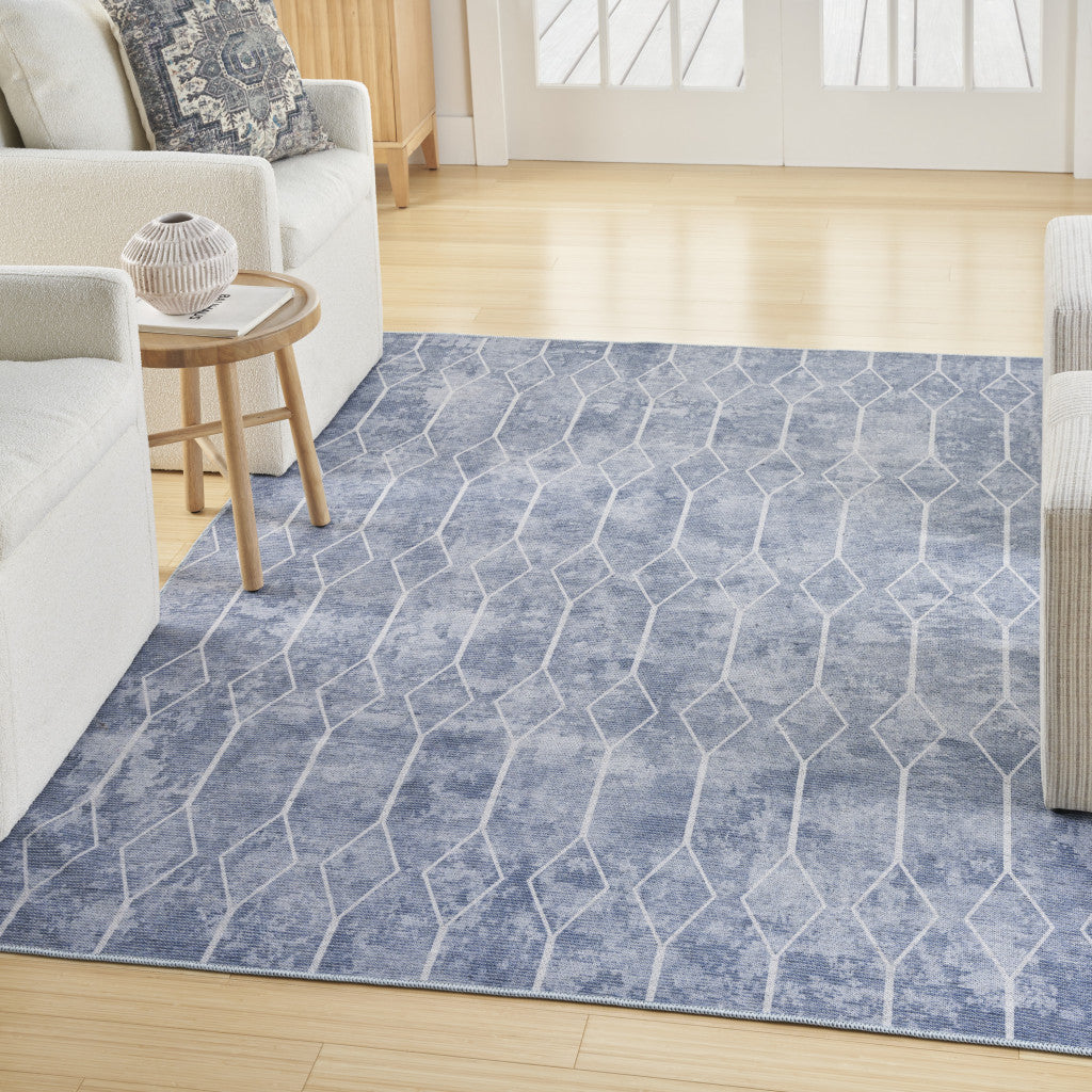 5' X 7' Blue and Off White Geometric Power Loom Washable Area Rug