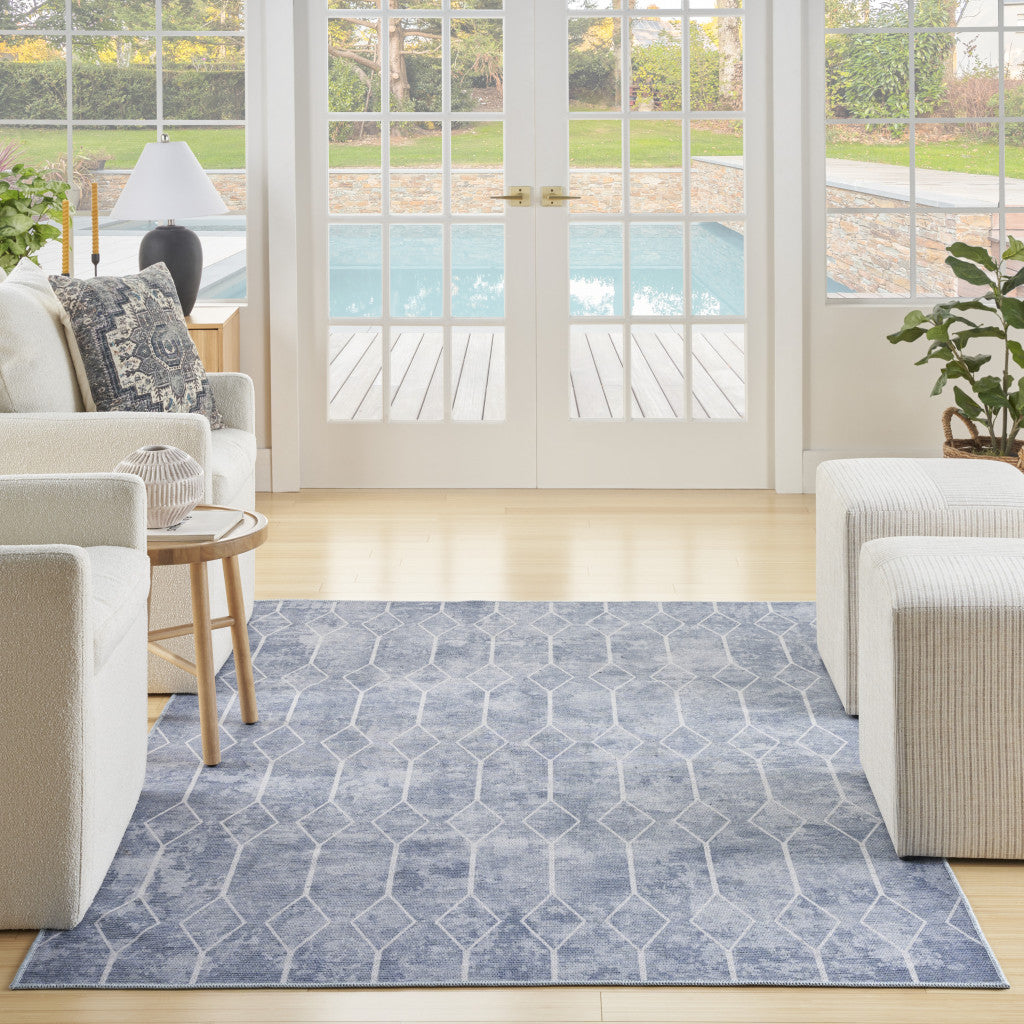 5' X 7' Blue and Off White Geometric Power Loom Washable Area Rug