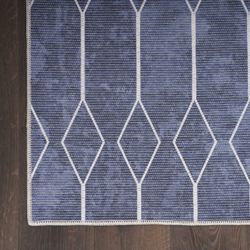 6' X 9' Blue and Ivory Geometric Power Loom Washable Area Rug