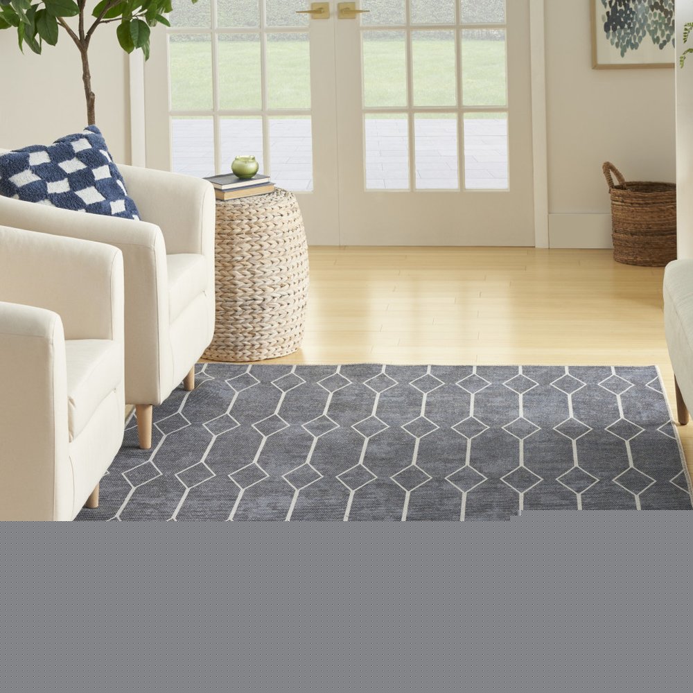 6' X 9' Blue and Ivory Geometric Power Loom Washable Area Rug