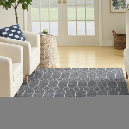 6' X 9' Blue and Ivory Geometric Power Loom Washable Area Rug