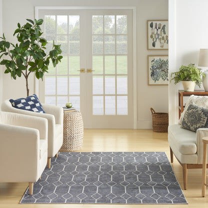 6' X 9' Blue and Ivory Geometric Power Loom Washable Area Rug