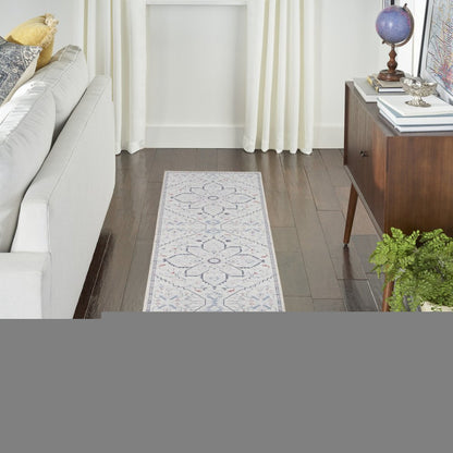 10' Ivory and Blue Oriental Power Loom Washable Runner Rug