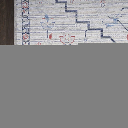 5' X 7' Ivory and Blue Oriental Power Loom Washable Area Rug