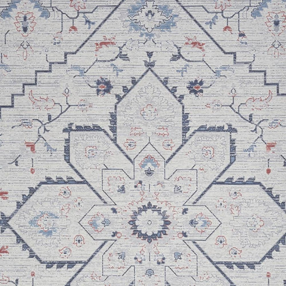6' X 9' Ivory and Blue Oriental Power Loom Washable Area Rug