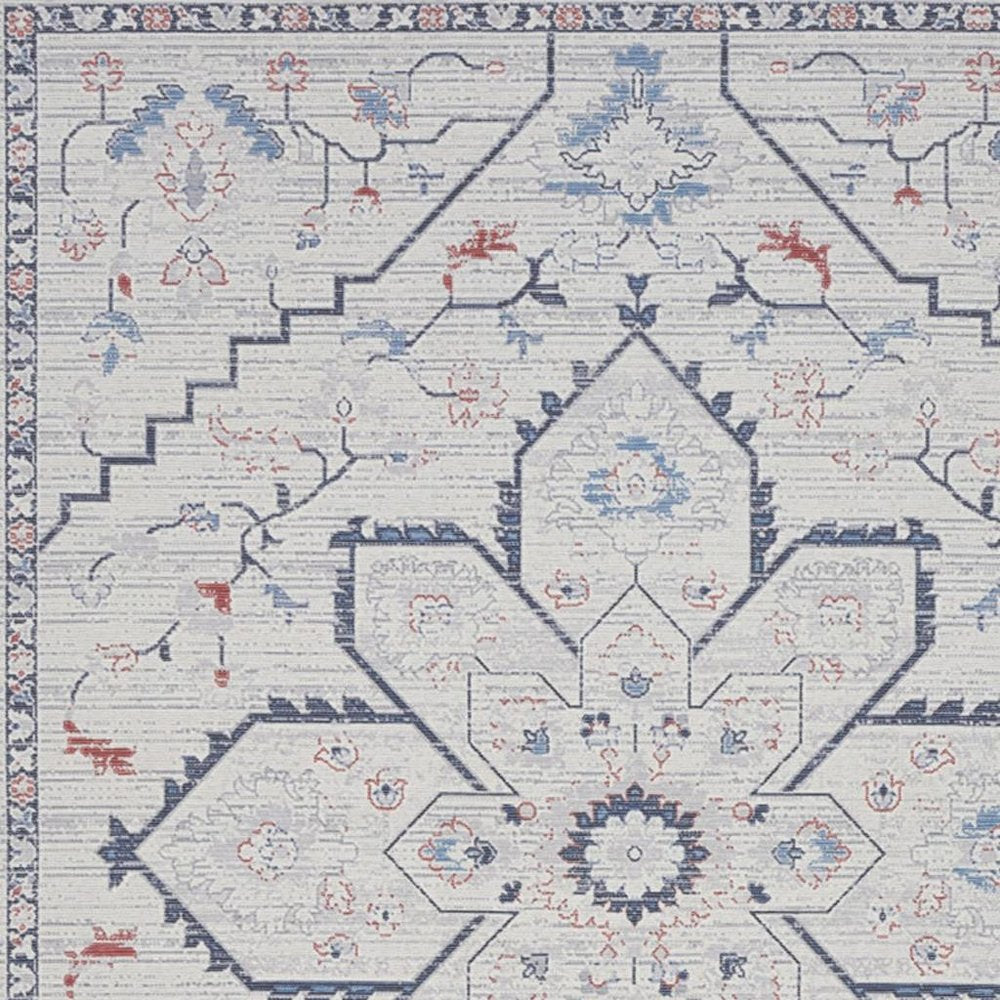 8' X 10' Ivory and Blue Oriental Power Loom Washable Area Rug