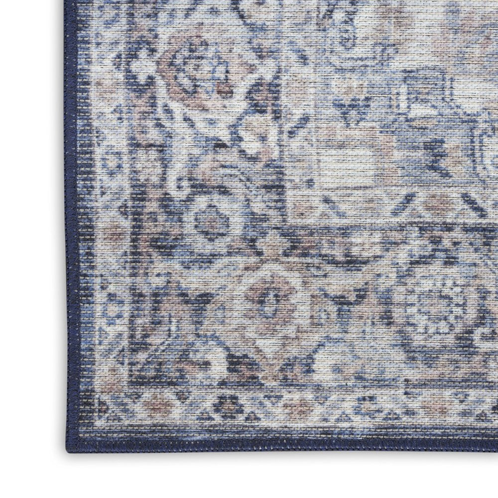 10' Blue and Ivory Floral Power Loom Distressed Washable Runner Rug