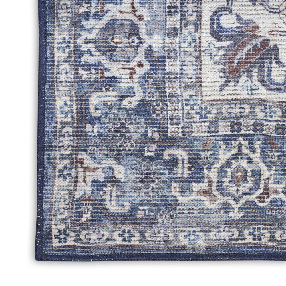8' Blue and Ivory Floral Power Loom Distressed Washable Runner Rug