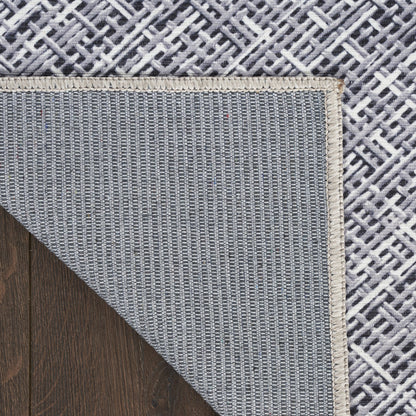 5' X 7' Gray and Ivory Abstract Power Loom Washable Non Skid Area Rug