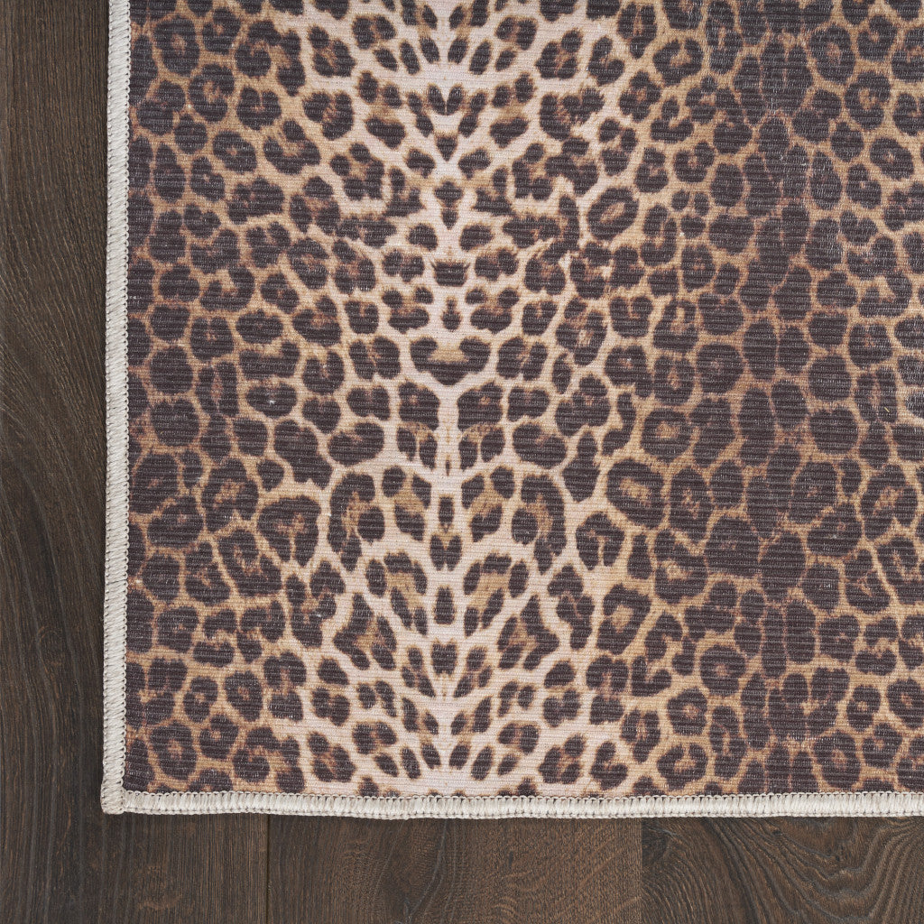 5' X 7' Brown and Ivory Leopard Print Power Loom Washable Non Skid Area Rug