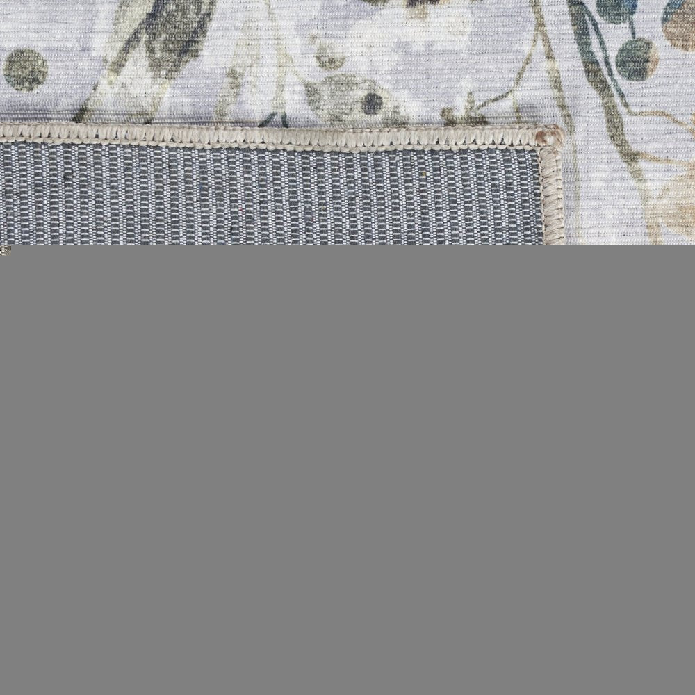 5' X 7' Ivory Blue and Gray Floral Power Loom Washable Non Skid Area Rug