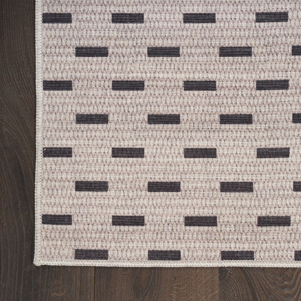 6' X 9' Ivory and Brown Geometric Power Loom Washable Non Skid Area Rug