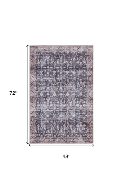 4' X 6' Blue and Ivory Oriental Power Loom Distressed Washable Non Skid Area Rug