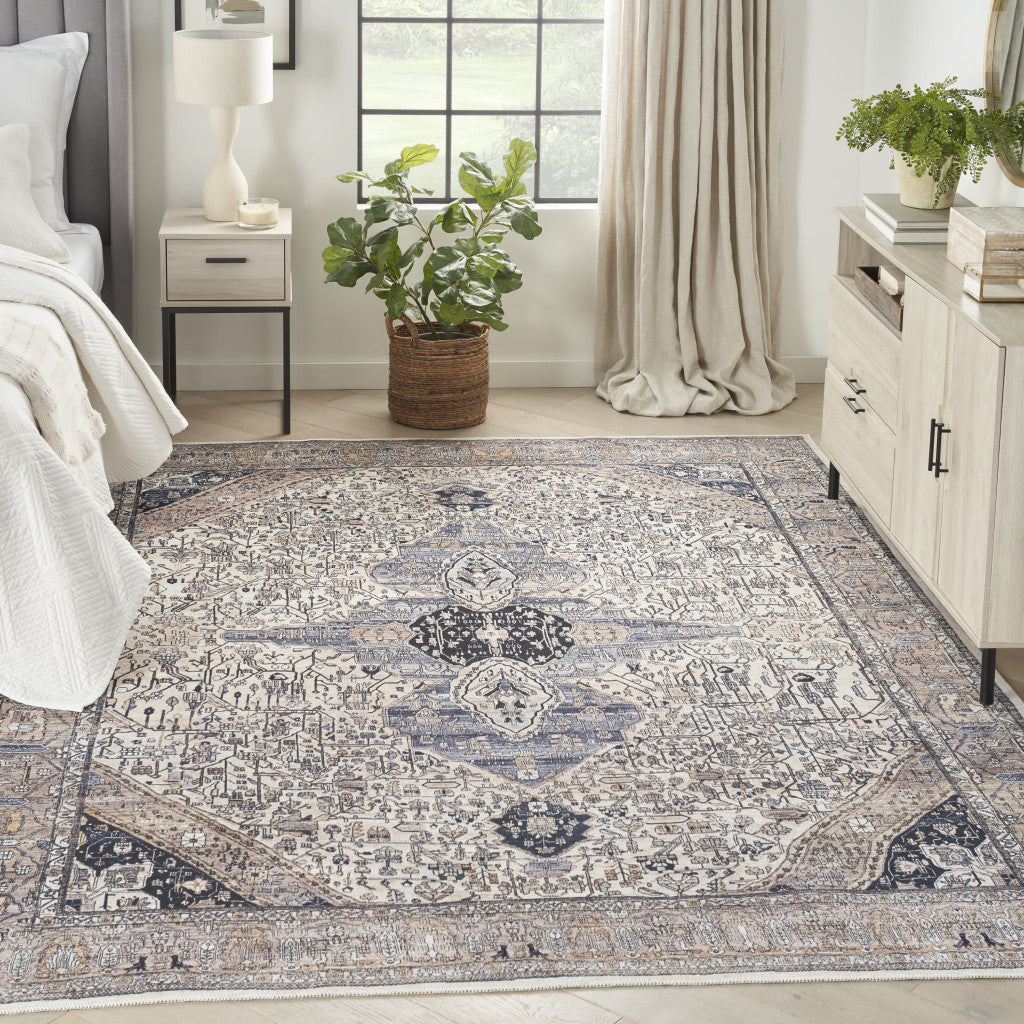 8' X 10' Ivory and Blue Oriental Power Loom Distressed Washable Non Skid Area Rug