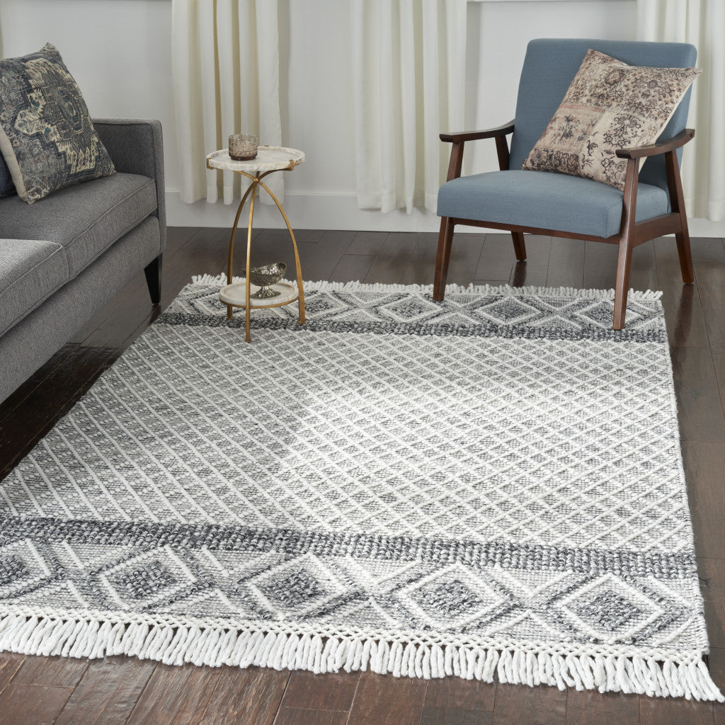 4' X 6' Gray and Ivory Geometric Hand Woven Area Rug With Fringe