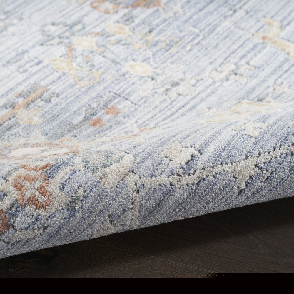 3' X 5' Blue and Ivory Oriental Power Loom Distressed Area Rug With Fringe