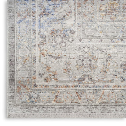 8' X 10' Ivory and Blue Oriental Power Loom Distressed Area Rug With Fringe
