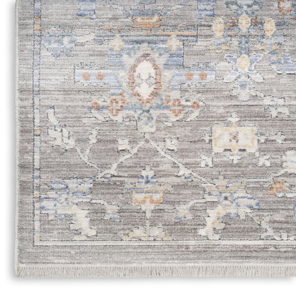 8' X 10' Ivory Blue and Gray Oriental Power Loom Distressed Area Rug With Fringe