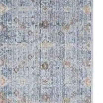 8' Blue and Ivory Oriental Power Loom Distressed Runner Rug With Fringe