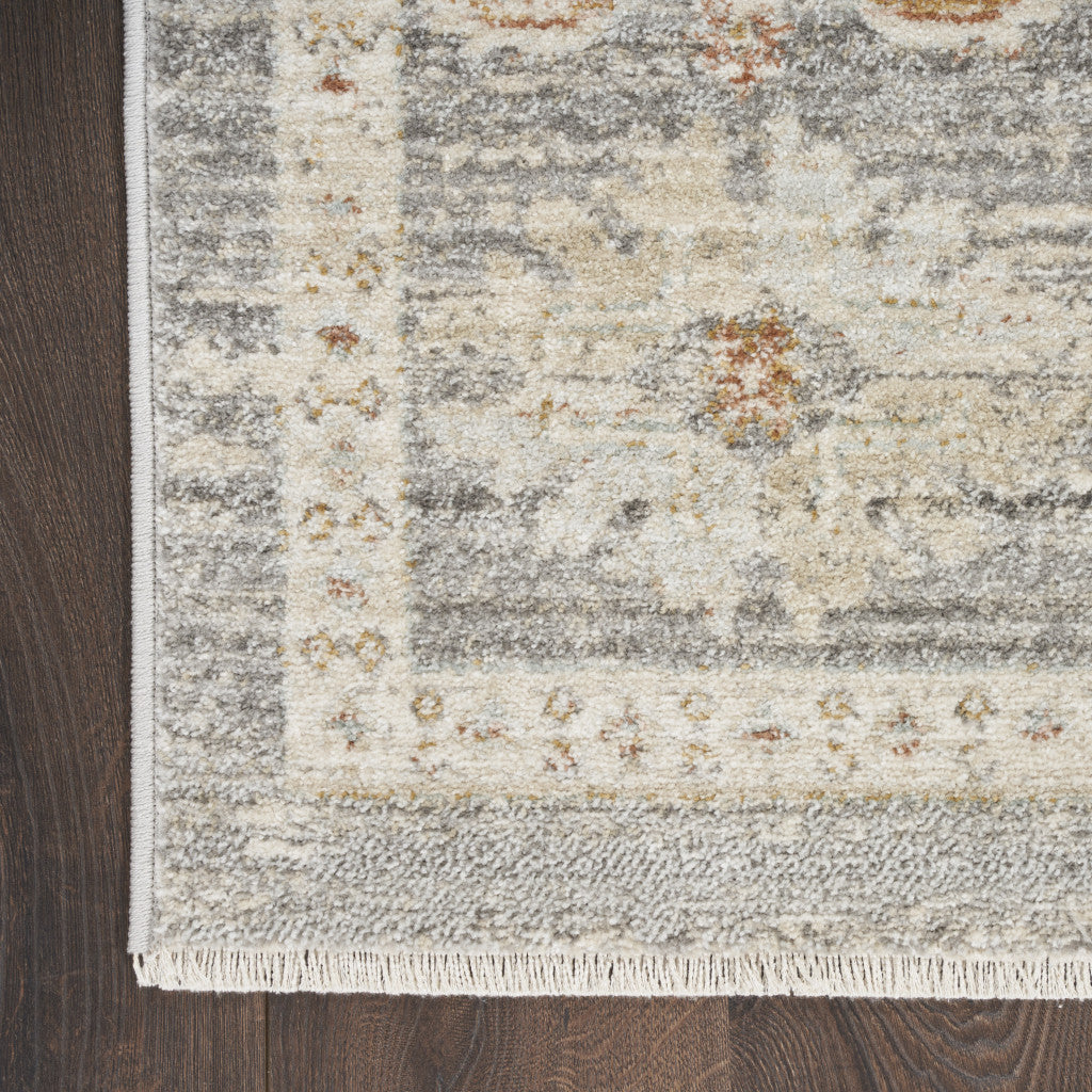 3' X 5' Beige Ivory and Gray Oriental Power Loom Distressed Area Rug With Fringe