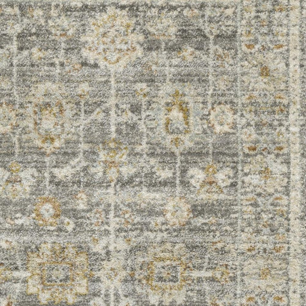3' X 5' Beige Ivory and Gray Oriental Power Loom Distressed Area Rug With Fringe