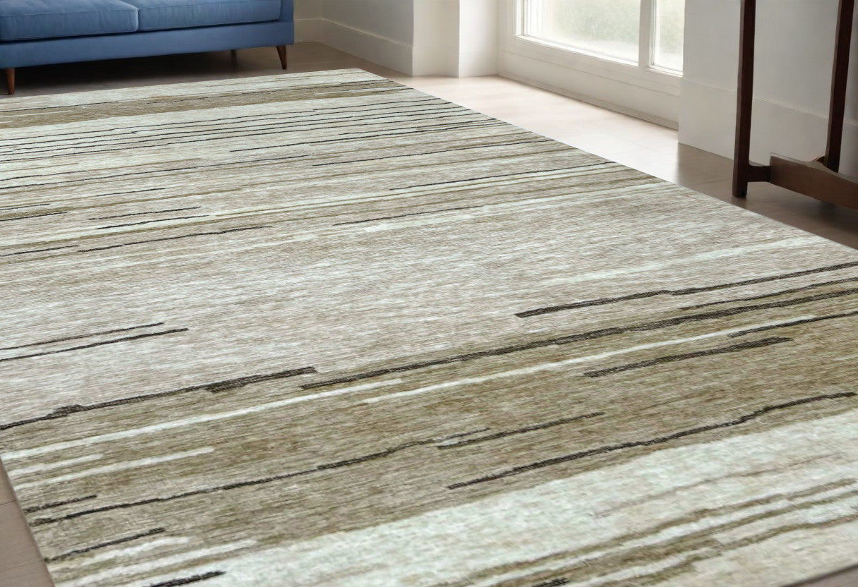 5' X 8' Beige and Brown Abstract Power Loom Distressed Area Rug