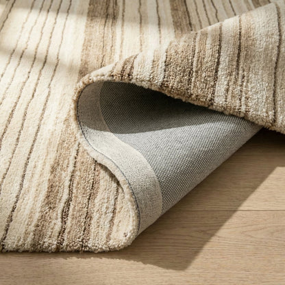 7' X 10' Beige and Brown Abstract Power Loom Distressed Non Skid Area Rug
