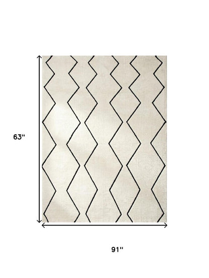 5' X 8' Beige and Black Geometric Power Loom Distressed Non Skid Area Rug