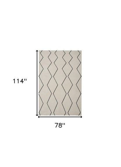 7' X 10' Beige and Black Geometric Power Loom Distressed Non Skid Area Rug