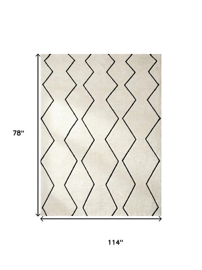 7' X 10' Beige and Black Geometric Power Loom Distressed Non Skid Area Rug