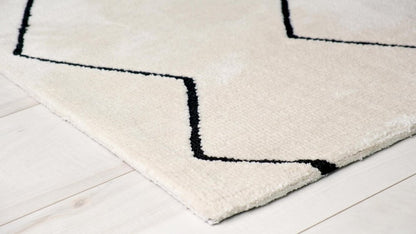 7' X 10' Beige and Black Geometric Power Loom Distressed Non Skid Area Rug