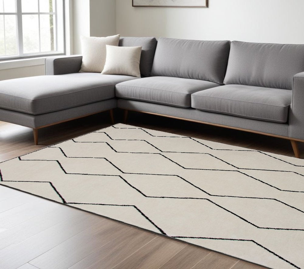 8' X 11' Beige and Black Geometric Power Loom Distressed Non Skid Area Rug