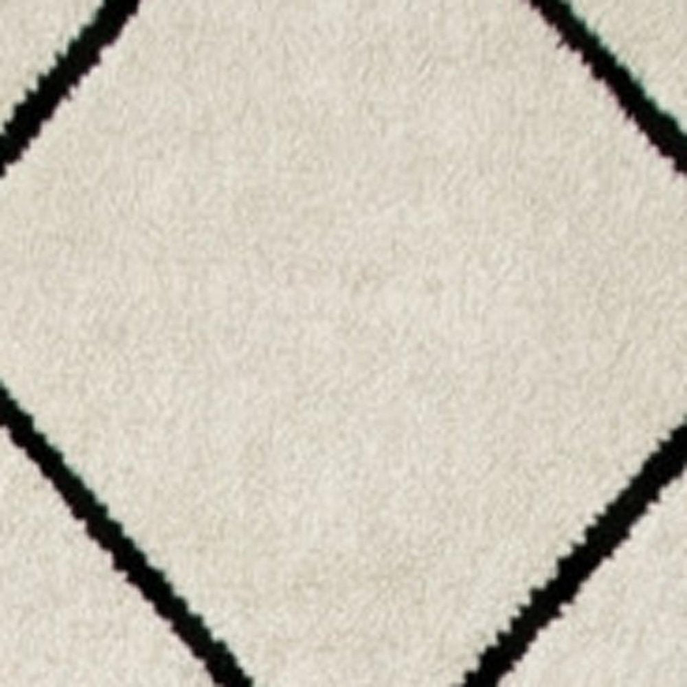 8' X 11' Beige and Black Geometric Power Loom Distressed Non Skid Area Rug