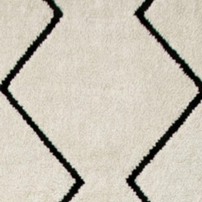 8' X 11' Beige and Black Geometric Power Loom Distressed Non Skid Area Rug