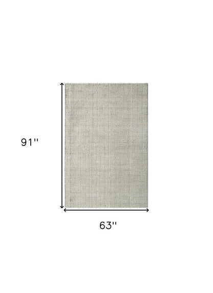 5' X 8' Beige and Black Checkered Power Loom Distressed Area Rug