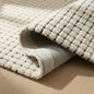5' X 8' Beige and Black Checkered Power Loom Distressed Area Rug