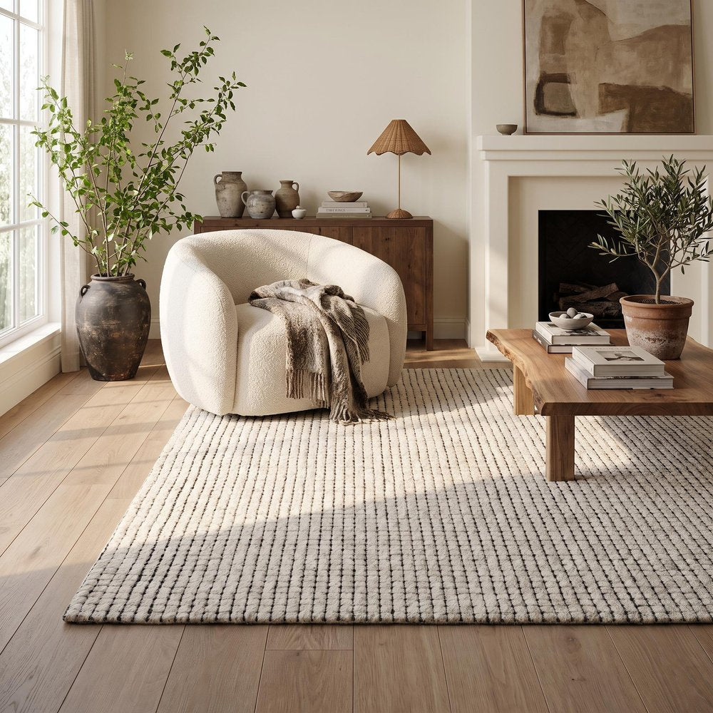 5' X 8' Beige and Black Checkered Power Loom Distressed Area Rug