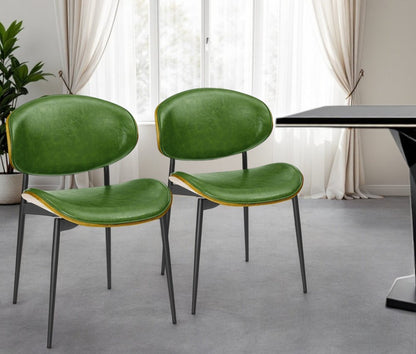 Set of Two Green and Black Upholstered Faux Leather Curved Back Dining Side Chairs
