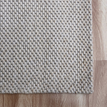 5' X 8' Beige Hand Woven Non Skid Area Rug