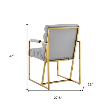 Set of Two Tufted Black And Gold Upholstered Faux Leather Dining Arm Chairs
