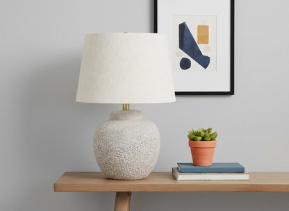 22" Cream Concrete Urn Table Lamp With Cream Abstract Empire Shade