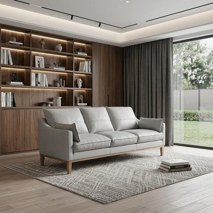 87" Gray Leather Sofa And Toss Pillows With Brown Legs