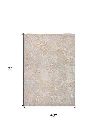 5' X 7' Beige and White Abstract Non Skid Area Rug