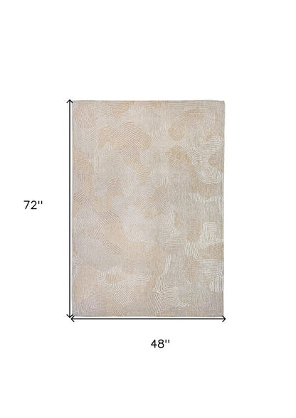 5' X 7' Beige and White Abstract Non Skid Area Rug