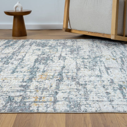 2' X 3' Blue and Ivory Abstract Area Rug
